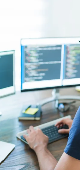 rear-view-young-latin-software-developer-programming-while-working-from-home